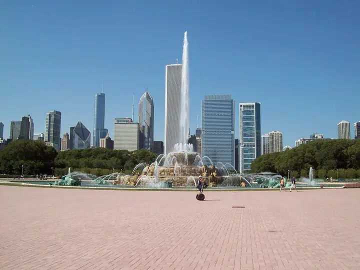 Buckingham Fountain's central jet rising in front of the Chicago skyline in Grant Park on a clear summer day.